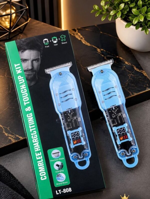 Tondeuse COMRLEE LT-808 bleue transparente posée à côté de sa boîte d'emballage verte et noire